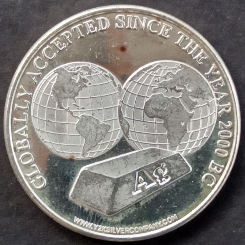 1999 1 Oz NWTM Y2K Official Barter Unit Obverse